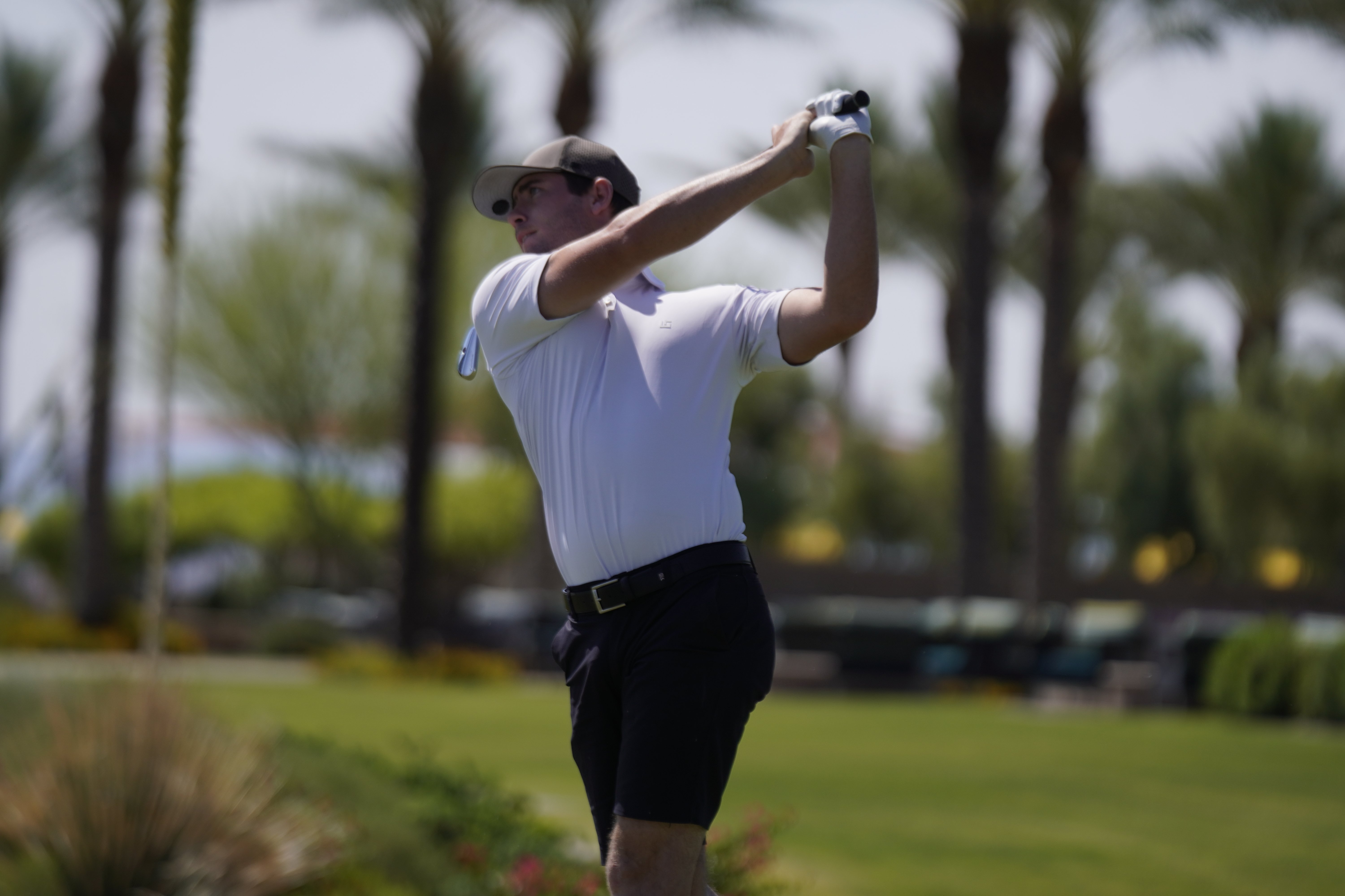 male golfer follow through